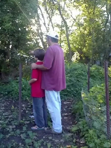 Young Brendan and his dad working together in the garden on the family property. An early lesson in doing things yourself